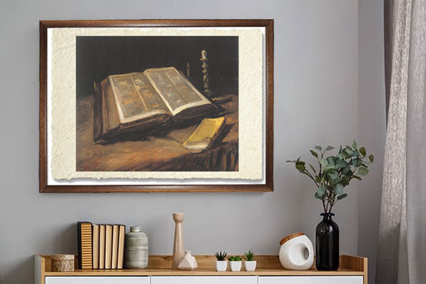 Open Bible with candlestick and novel, Van Gogh. Reproduction