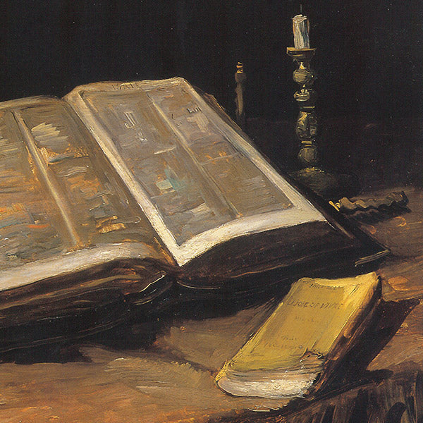 Open Bible with candlestick and novel, Van Gogh. Reproduction
