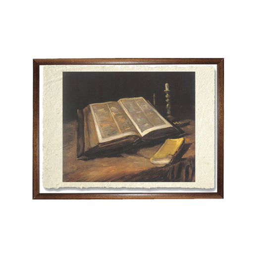 Open Bible with candlestick and novel, Van Gogh. Reproduction